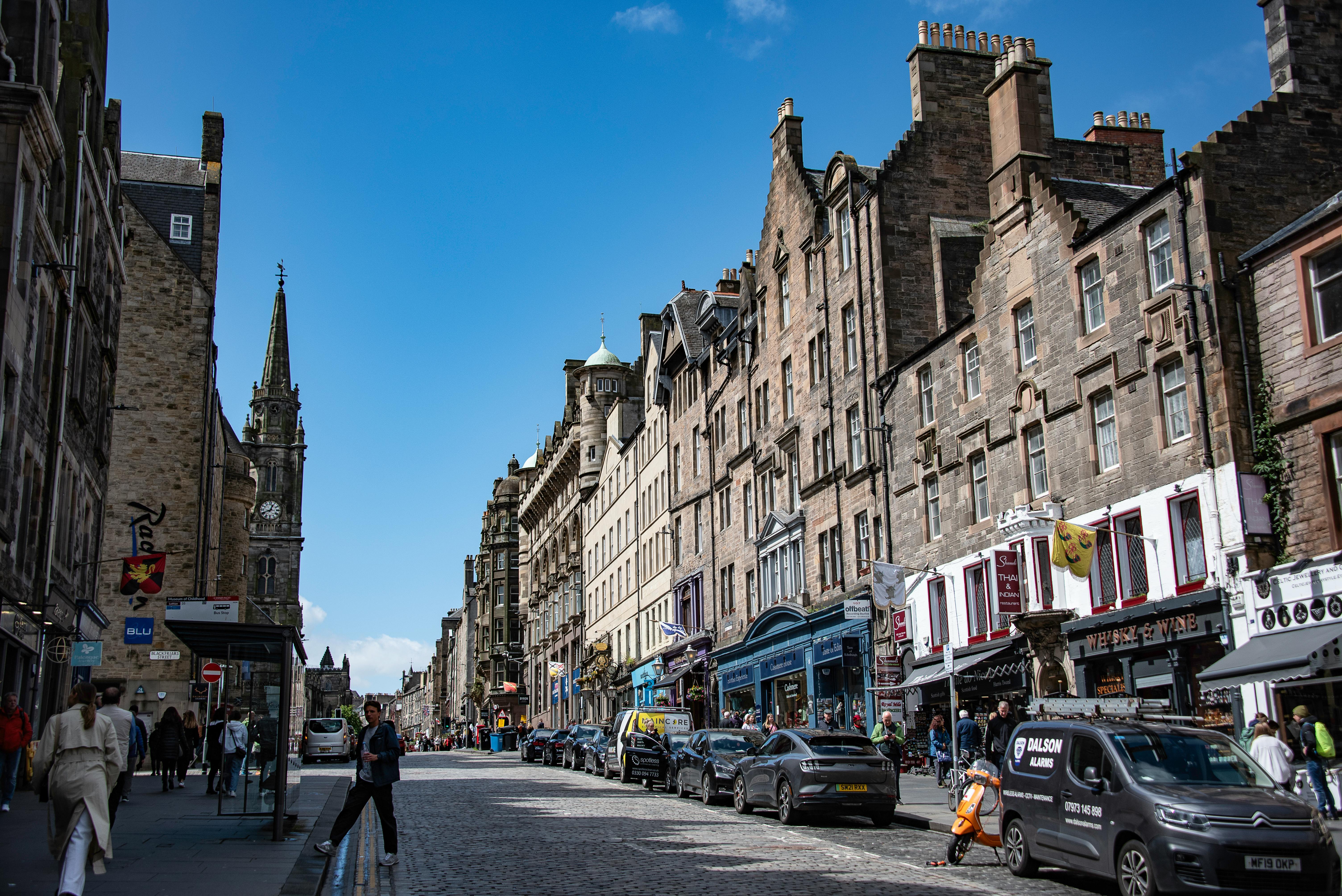 Edinburgh Weekend Breaks scenic cityscape with historic buildings and cobblestone streets