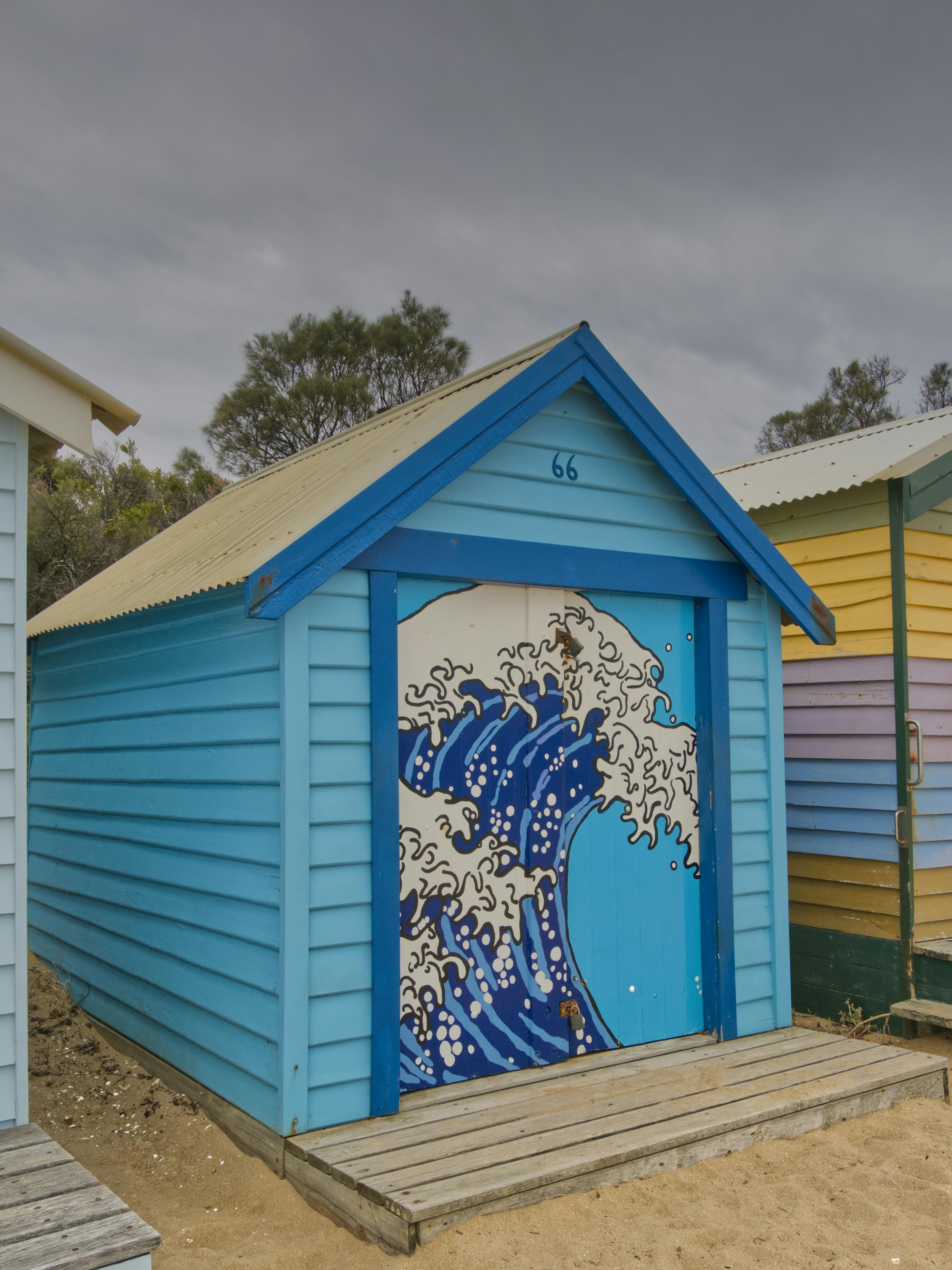 Seaside promenade, beach huts, Brighton coast